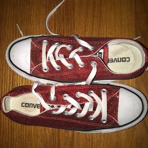Red low top glitter converse